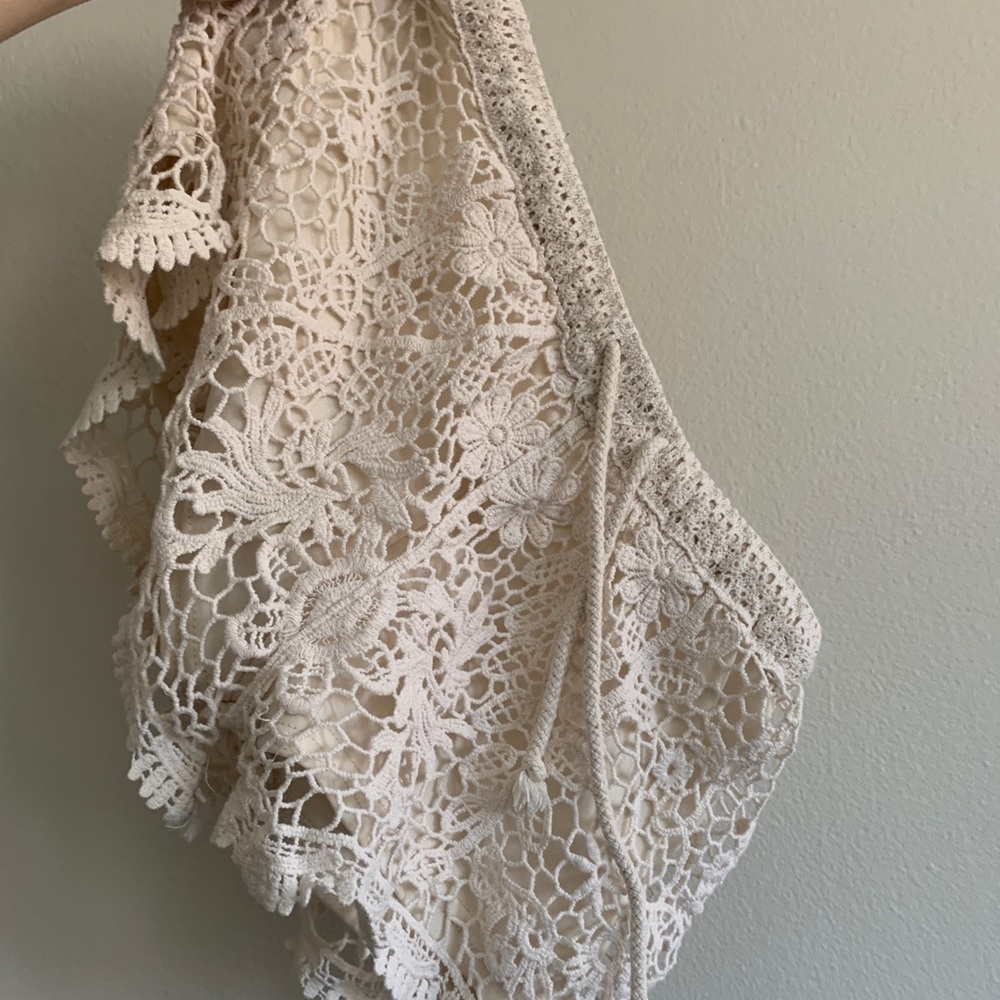 Cream knitted like short shorts.